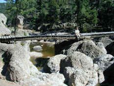 Kim crossing bridge.jpg (72575 bytes)