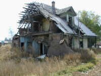 adobe wood home.JPG (403837 bytes)